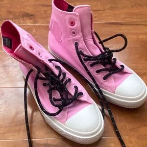 Converse high top, new . Men size 8,5 women 9,5